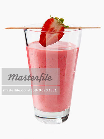 A strawberry smoothie with a strawberry on a cocktail stick A strawberry smoothie with a strawberry on a cocktail stick