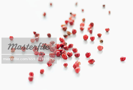 Scattered red peppercorns