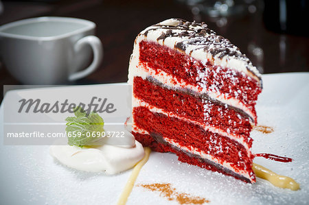 A slice of Layered Red Velvet Cake