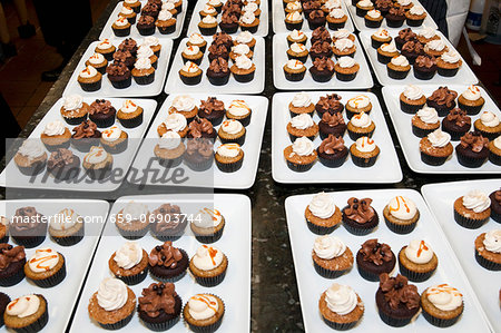 Many Platters of Assorted Cupcakes