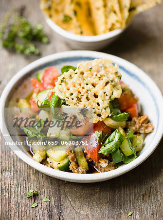 Bread salad with parmesan crisps