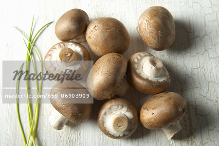 Fresh chestnut mushrooms and chives