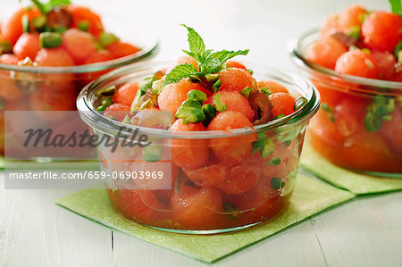 Watermelon and Date salad with roasted pistachios, selective focus