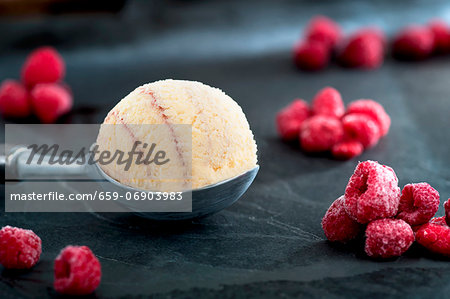 Raspberry ice cream and frozen raspberries