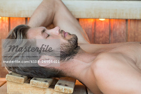 Close-up of a man resting in a sauna