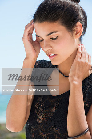 Beautiful woman posing on the beach