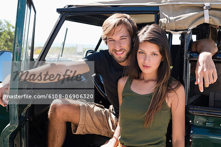 Portrait of a couple on SUV