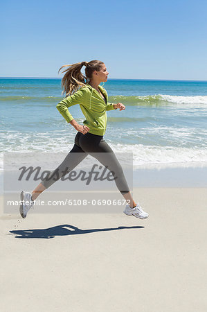 Woman jogging on the beach