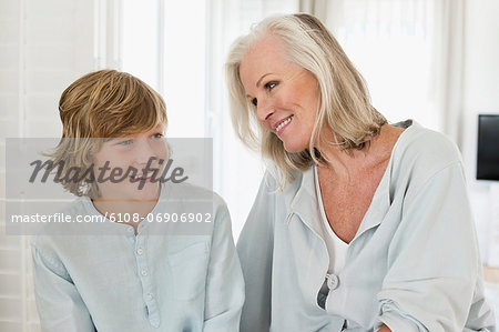 Woman and her grandson smiling