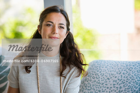 Close-up of a woman smiling Close-up of a woman smiling