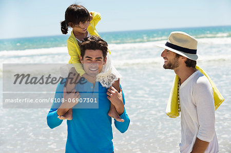 Family enjoying vacations on the beach