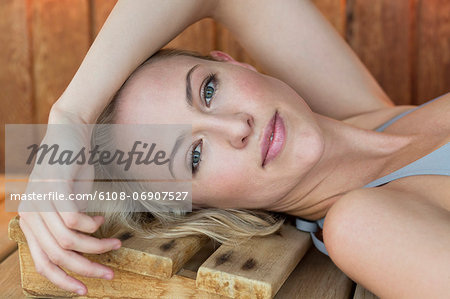 Portrait of a woman resting in a sauna