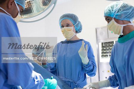 Surgeons talking in operating room