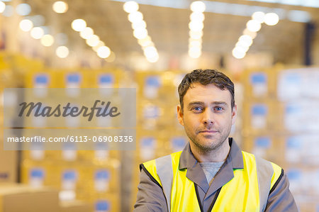 Worker standing in warehouse