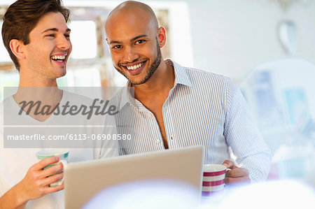 Men having coffee together
