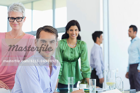 Business people smiling in office