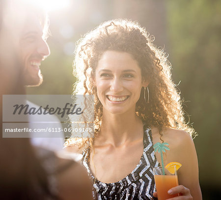 Couple having drinks outdoors