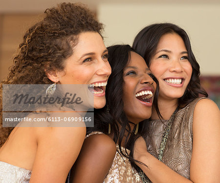 Women smiling together at party