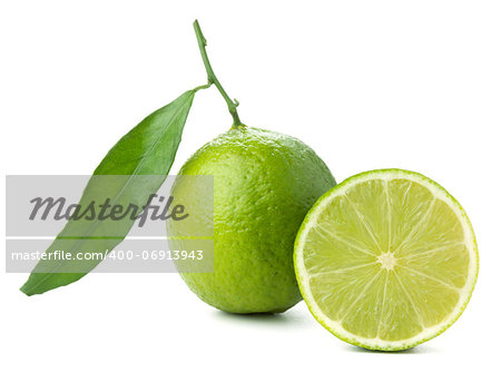 Fresh lime with green leaf. Isolated on white