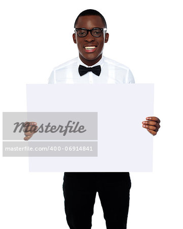 Smiling business representative in glasses holding blank whiteboard