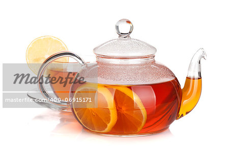 Glass teapot and cup of black tea with lemon. Isolated on white background