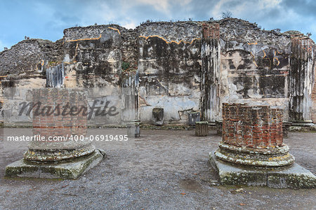 columns and ruins of Pompeii , which was destroyed and buried during the eruption of Mount Vesuvius in 79 AD