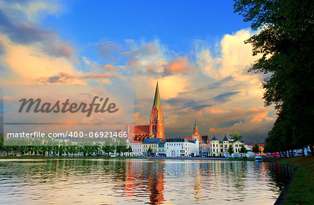 The Schwerin Cathedral behind the Pfaffenteich. HDR image, very vibrant colors.