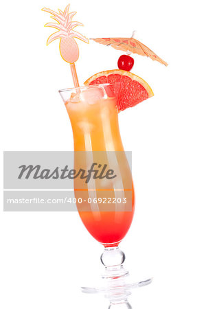 Orange tropical alcohol cocktail with grapefruit slice and maraschino isolated on white background