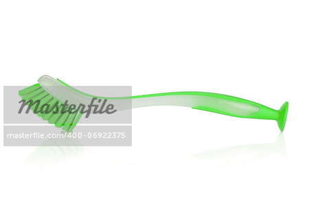 Green cleaning brush. Isolated on white background