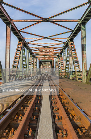 Rusty old steel bridge Friesenbrucke close to Weener in Germany
