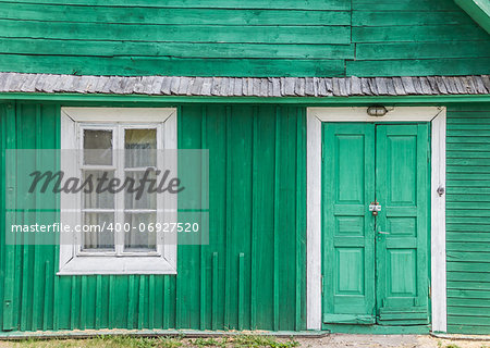 Detail of a traditional green wooden house in Trakai, Lithuania