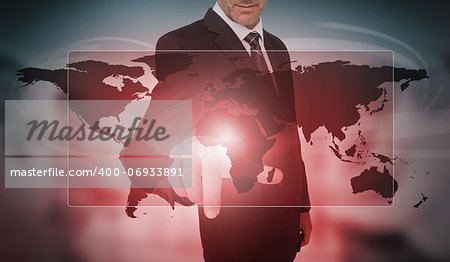 Businessman selecting futuristic panel interface on world map background