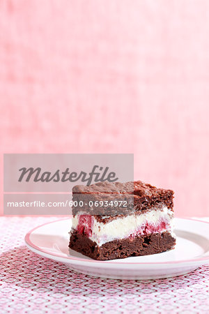Brownie Ice Cream Sandwich with Raspberry Ice Cream, Pink Background, Studio Shot
