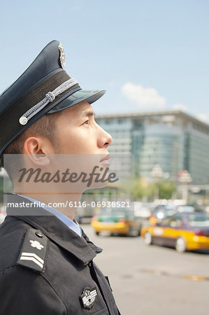 Police Officer looking up, profile