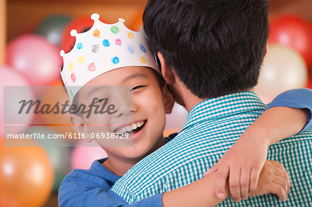 Birthday Boy Hugging His Father