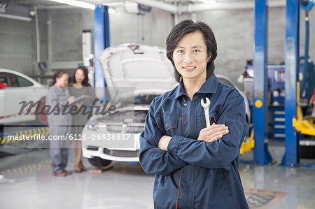 Male Mechanic in Auto Repair Shop Male Mechanic in Auto Repair Shop