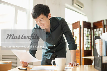 Young Man Working in Creative Office