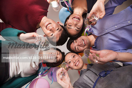 Business Colleagues Celebrating With Champagne