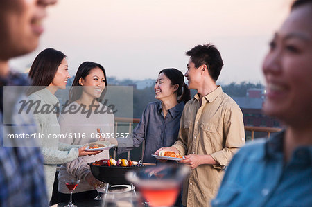 Friends Drinking on Rooftop