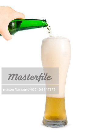 Hand holding bottle of beer and beer mug. White isolated studio shot.