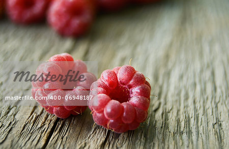 Fresh Ripe Sweet Raspberry on Wooden Background. Fresh Organic Food. Closeup