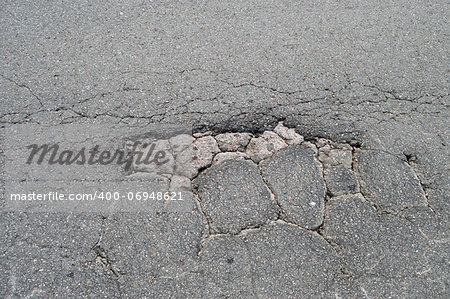 pothole on the pavement