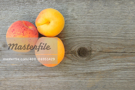 Ripe Tasty Apricots on the Old Wooden Table. Natural Food