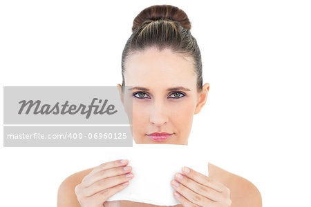 Gorgeous woman blowing nose posing on white background
