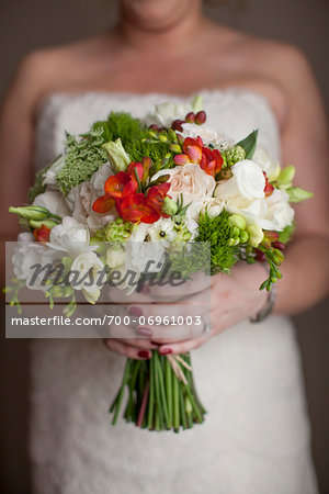 Close-up of Bride holding bridal bouquet on Wedding Day, Canada