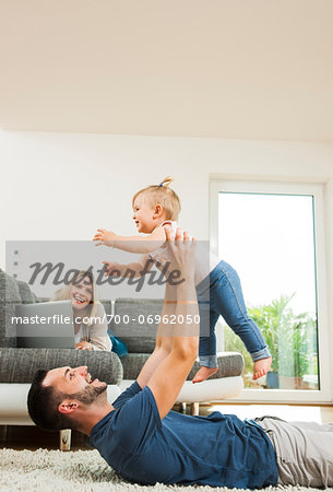 Family in Living Room at Home, Mannheim, Baden-Wurttemberg, Germany