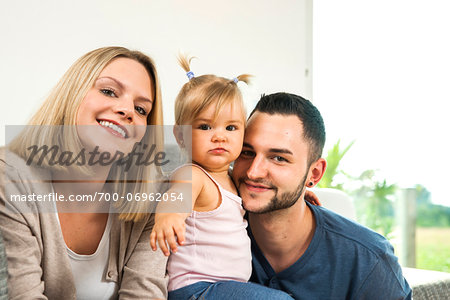 Portrait of Family in Living Room at Home, Mannheim, Baden-Wurttemberg, Germany