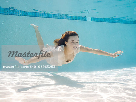 USA, Utah, Orem, Portrait of young woman under water