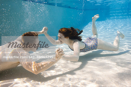 USA, Utah, Orem, Young couple under water