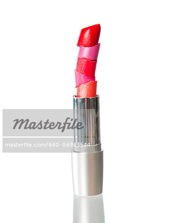Five different coloured lipsticks stacked Five different coloured lipsticks stacked